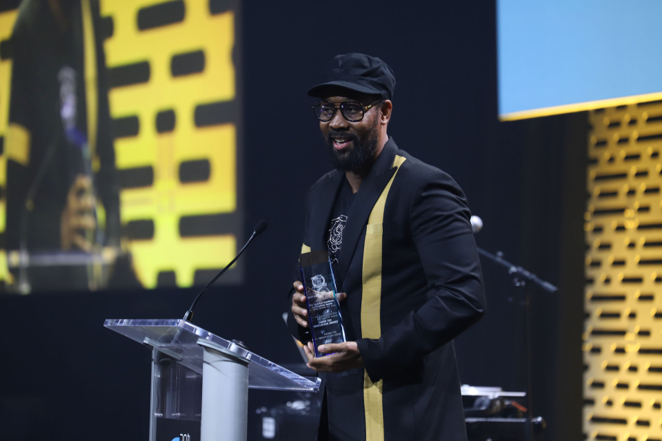 The RZA accepts an award