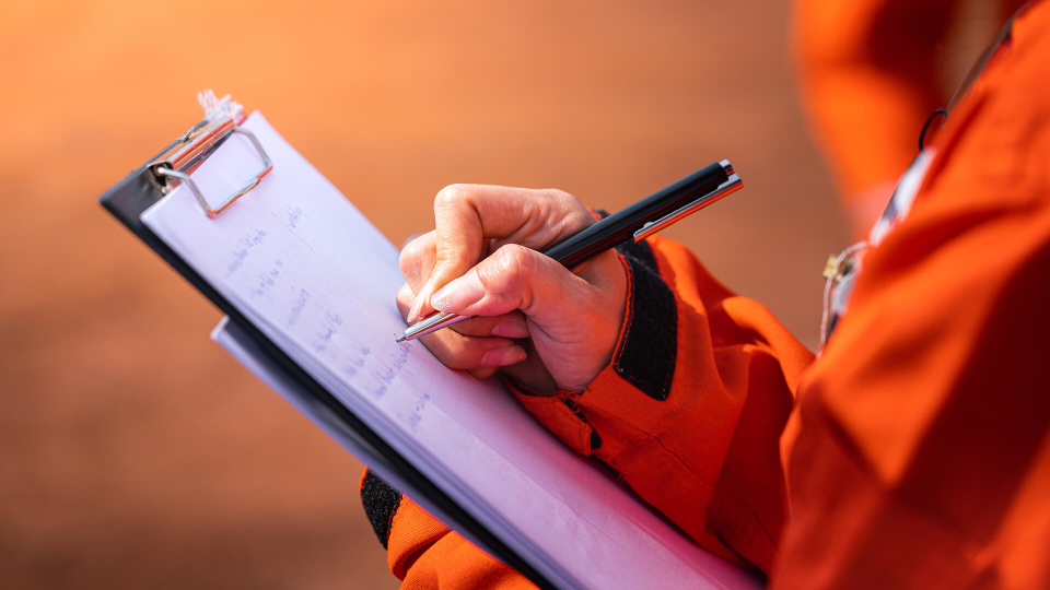 Contractor with clipboard