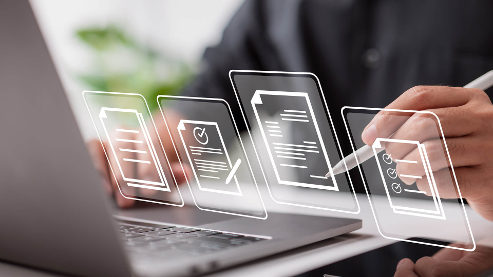 Digital documents being signed on laptop