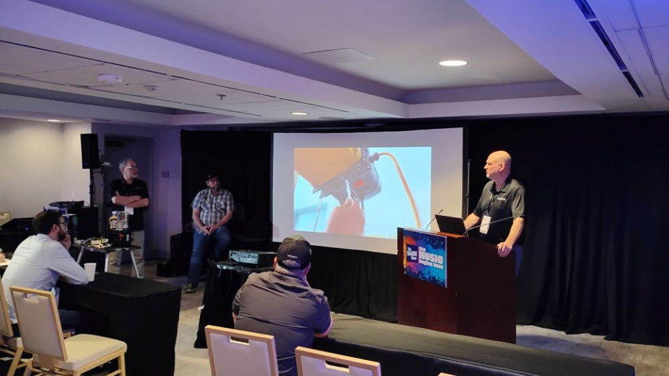 an electric chain motor safety session for live event pros at the namm show