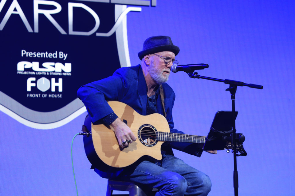 Mike Lawson plays guitar at the parnelli awards