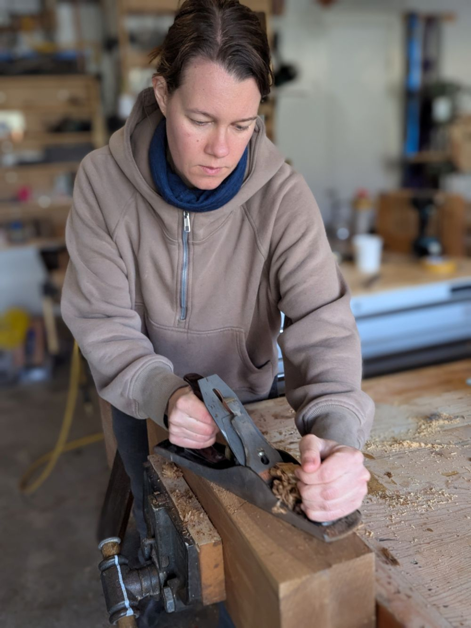 Luthier Zoe Jet builds a guitar in her workshop