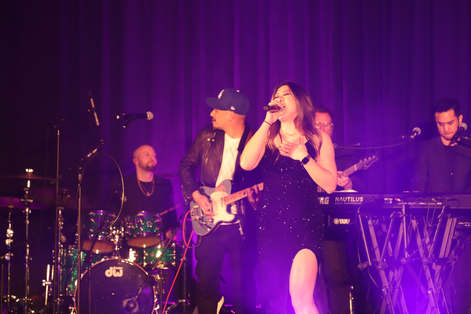 a live band performs at the namm retail awards