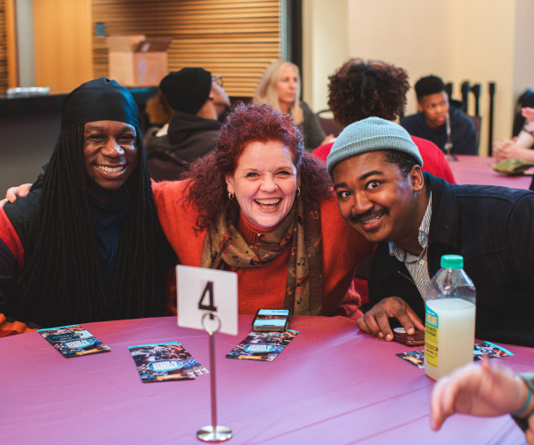 two college students sitting with namm member