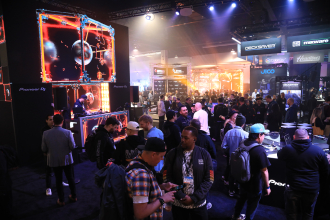 Attendees enjoy The NAMM Show floor