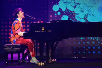 jacob collier plays piano at the 2025 namm show