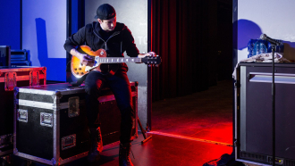 a man works as a music equipment rental pro